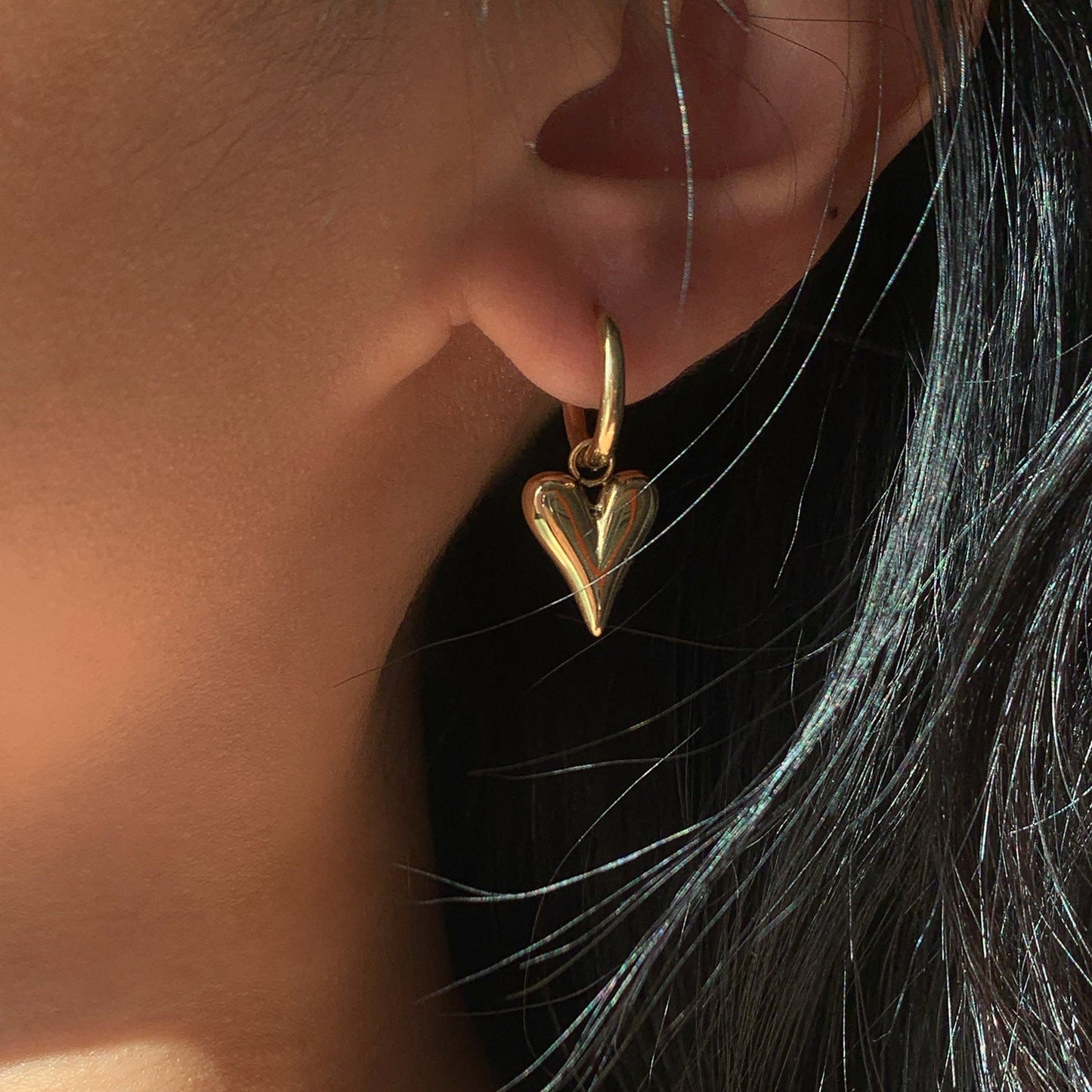 Elegant Hoop Earrings with Heart Pendants