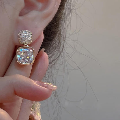 Elegant Earrings With Square Cut Design