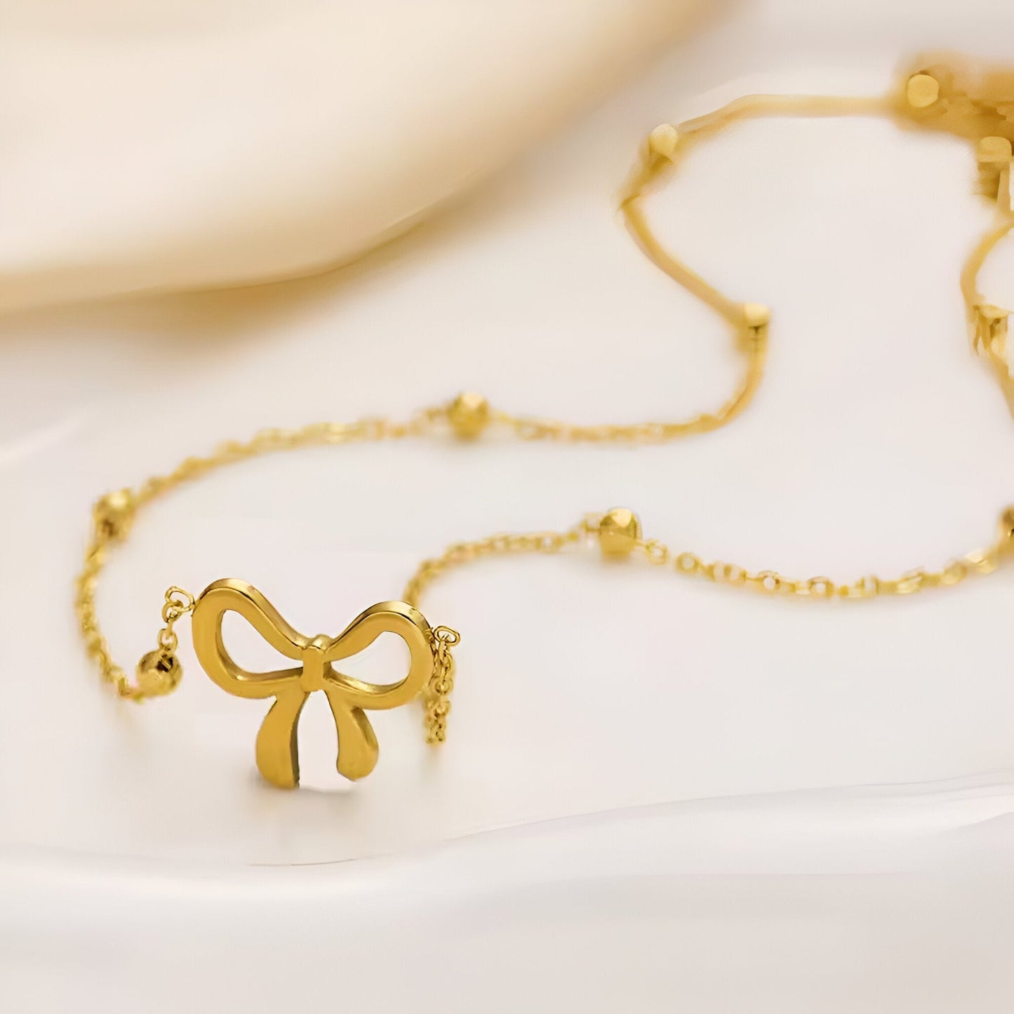 Elegant Gold Bowknot Beaded Necklace