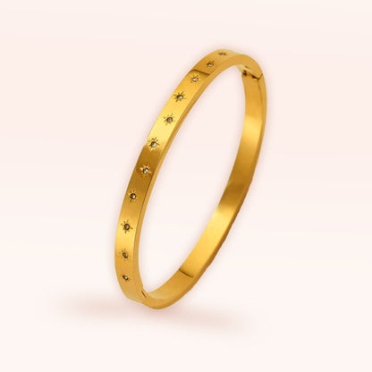 Gold Star Engraved Oval Bangle