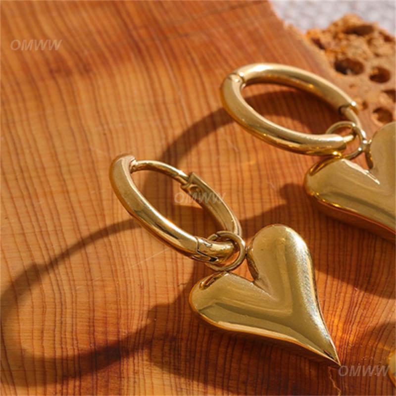 Elegant Hoop Earrings with Heart Pendants