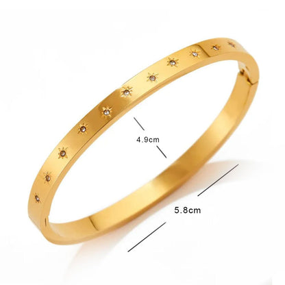 Gold Star Engraved Oval Bangle