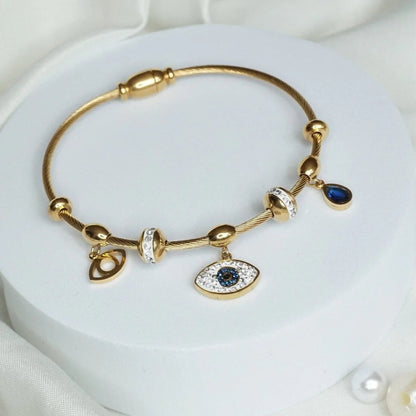 Evil Eye Charm Bracelet with Blue Sapphire Accents