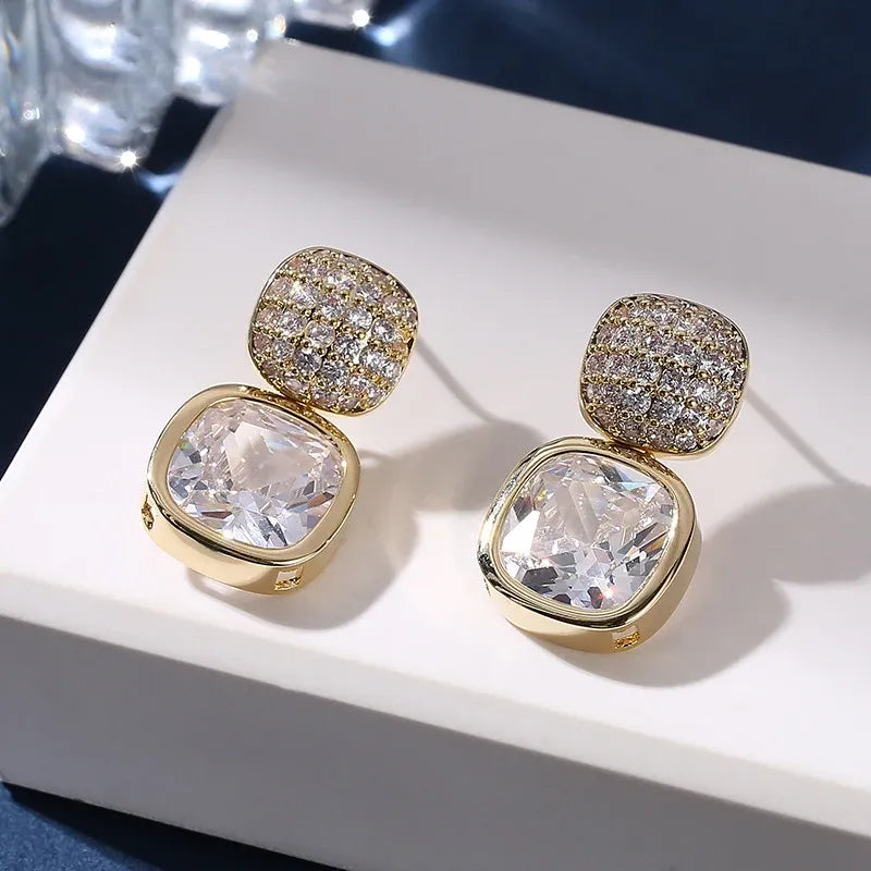 Elegant Earrings With Square Cut Design